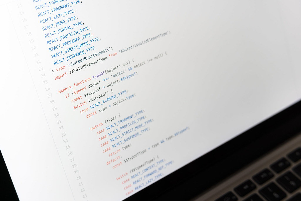 Code displayed on a laptop screen, representing a WordPress software update