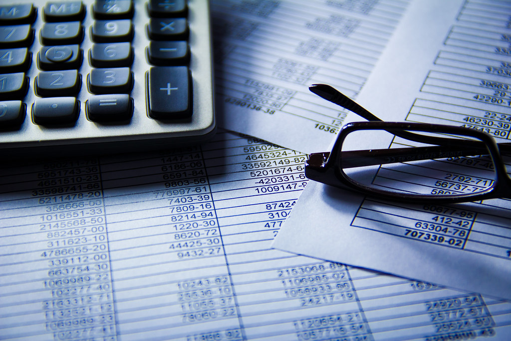 Calculator and financial numbers, representing website cost planning
