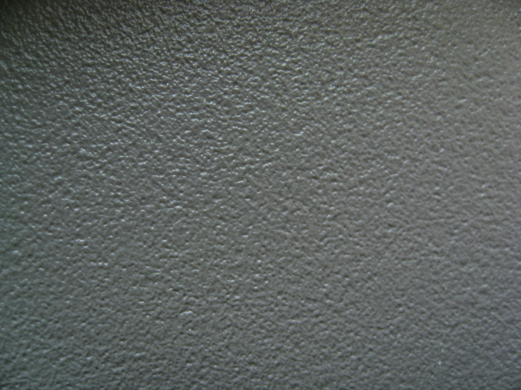 Close-up of a car interior dashboard surface, representing a vehicle detail page photo