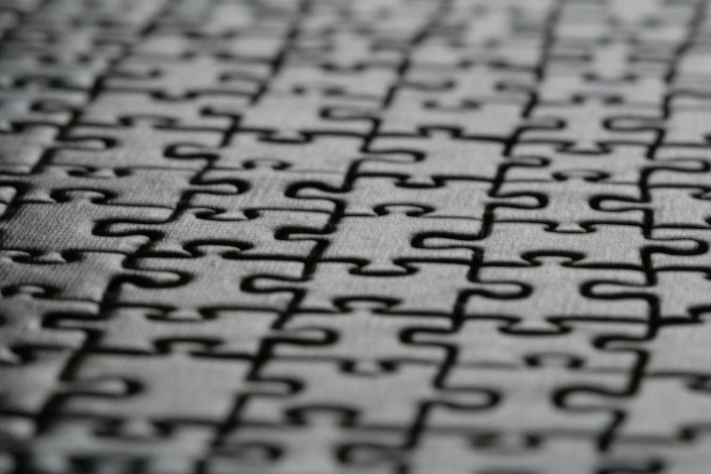 Jigsaw puzzle pieces representing WordPress plugins fitting together